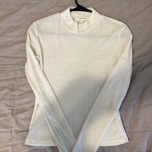 White mock neck top